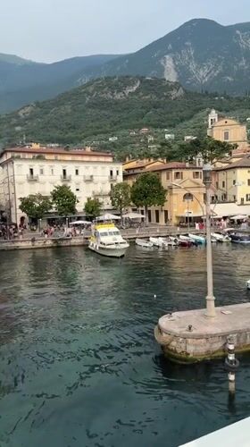 Malcesine's harbor, streets, and castle on Lake Garda
