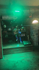 Acoustic guitarist performs during dinner service at Dublin pub