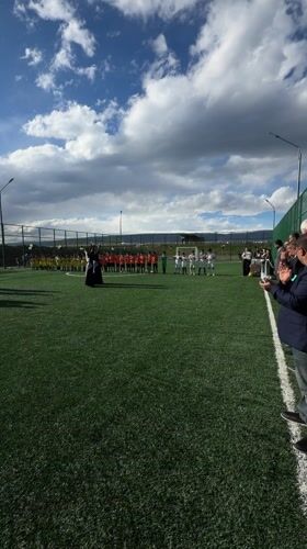Robed figures perform ritual on soccer field in Armenia
