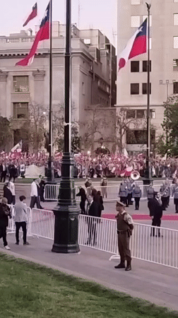 Political Rally Draws Crowds to Santiago's Government District