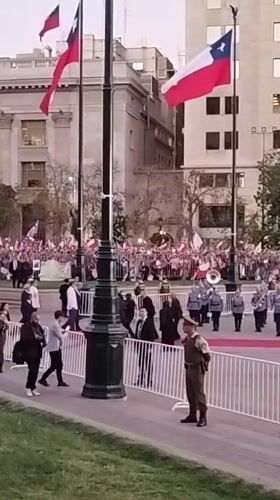 Political Rally Draws Crowds to Santiago's Government District