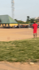 Soccer match draws crowd on dirt field in Umuode