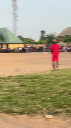 Soccer match draws crowd on dirt field in Umuode
