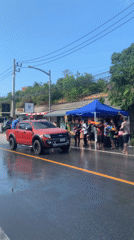 Water gun celebration observed alongside wet road in Thailand
