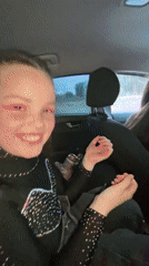 Two women filmed while driving in Noviy, Russia