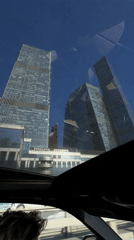 Moscow drivers capture skyscraper views through car sunroof