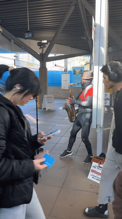 Spider-Man street performer entertains at Burnaby SkyTrain station