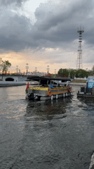 Tourist boat navigates Svislach River in downtown Minsk