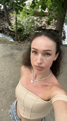 Outdoor walk in Kazan with heart necklace and denim