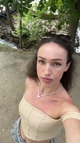Outdoor walk in Kazan with heart necklace and denim