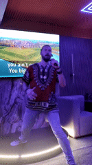 Karaoke venue hosts evening entertainment with singing and socializing