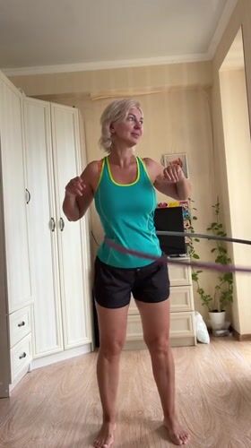 Hula hoop workout session indoors in Sochi