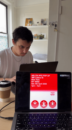 Person works on laptop in leather chair in New York