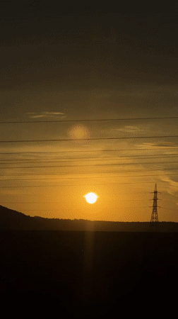 Sunset captured over power lines in Lovech, Bulgaria