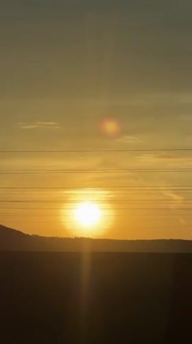 Sunset captured over power lines in Lovech, Bulgaria