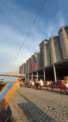 Aperol, deck chairs, and murals at Beton Hala