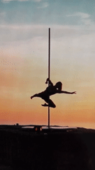 Woman performs outdoor pole dancing routine in Budva, Montenegro