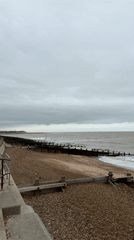 Cloudy day at East Suffolk beach with choppy seas