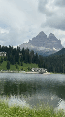 Lazy morning on a mountain lake in the Dolomites