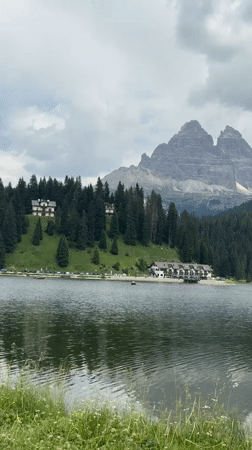 Lazy morning on a mountain lake in the Dolomites