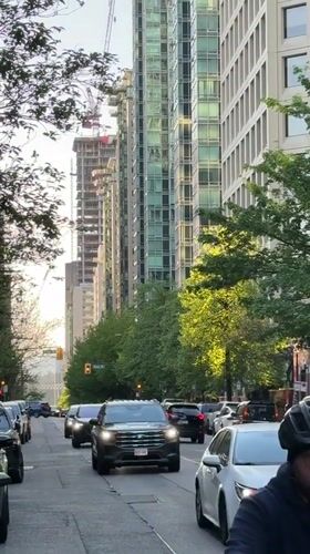 Early morning traffic and cyclist observed on Vancouver street
