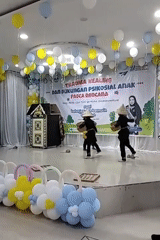Children perform at post-disaster trauma healing event in Lhokseumawe