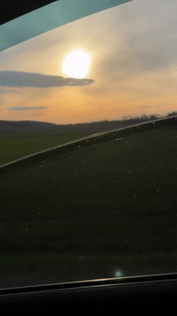 Sunset drive captured through rural Russian countryside near Starye Chuti