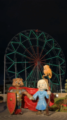 Nighttime scenes document statues, Ferris wheel in Sirius, Russia