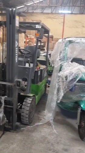 Lagos warehouse operations and outdoor washing activities documented