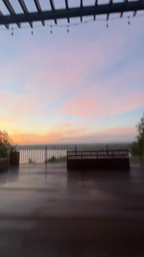 Solstice dusk lingers over Novodvinsk's forest boardwalks