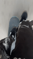 Skateboarder rides through Barcelona streets Monday evening