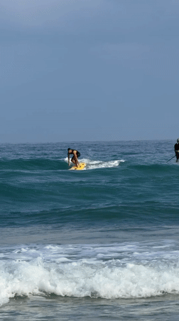 Surfing and paddleboarding on a Bat Yam morning