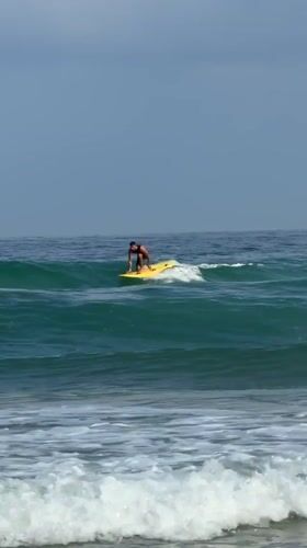 Surfing and paddleboarding on a Bat Yam morning