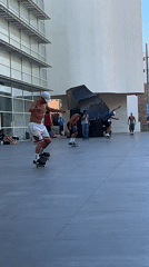 Barcelona Pride parade meets street skating on a sunny afternoon