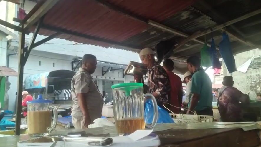 Busy fish market captured in Lhokseumawe Indonesia early morning