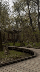 Moscow park visit features wooden walkways, Asian gazebo