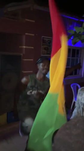 Nighttime gathering features dancing, flag-waving in Kuru Karama, Nigeria