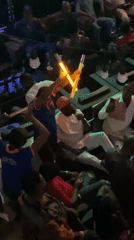 Nightclub gathering with DJ performance captured in Obosi, Nigeria