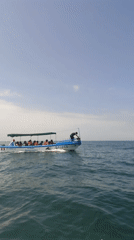 Passenger boat LIZBEL tows banana boat near Cancas, Peru