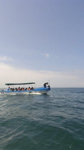 Passenger boat LIZBEL tows banana boat near Cancas, Peru