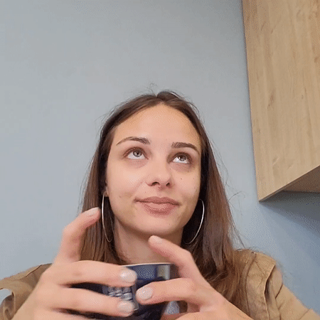 Woman enjoys morning coffee in Kragujevac cafe