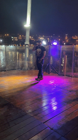 Rapper performs on outdoor stage in Ancón, Peru