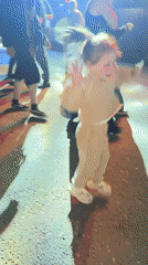 Dancing at a lit outdoor night event in Sol-Iletsk