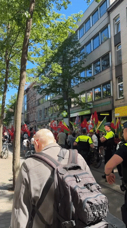May Day demonstration with red flags draws crowd in Antwerp