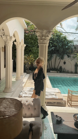 Woman in bikini and cowboy boots spotted in North Kuta garden