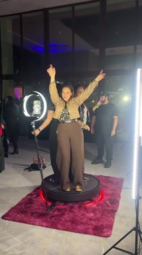 360-degree video booth moment at a lit-up event in Arica