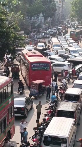 Morning street life documented across busy Dhaka neighborhoods