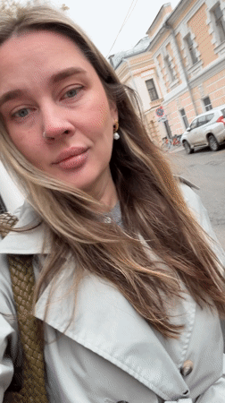 Woman takes mirror selfie in Moscow interior