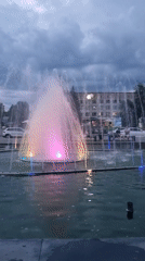 Smila's colorfully lit fountain runs at dusk