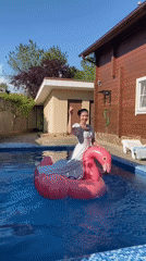 Women enjoy sunny afternoon at residential pool in Dagomys